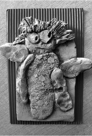 Anděl z keramické hlíny